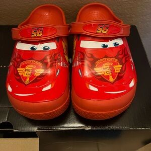 Kids size 3 Lightning McQueen crocs, new.
